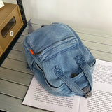 Casual denim student bag  Portable multi-functional travel backpack  Light blue fashionable denim backpack