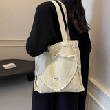 Fashionable Canvas Heart-Shaped Shoulder Tote Bag, a Popular Choice for Women, Perfect for Commuting And College Students Attending Classes.